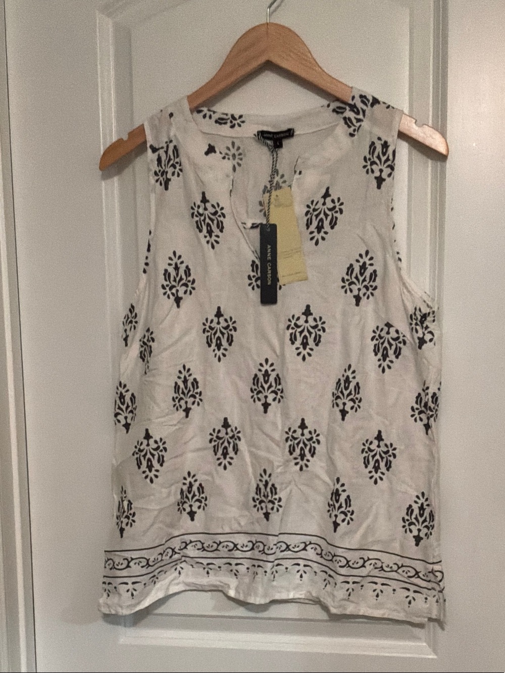 Women’s  White sleeveless blouse with Black Floral Print size L
